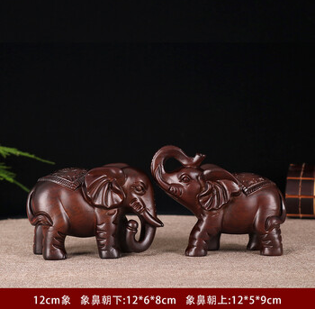 Twin Elephant Calf Sculptures